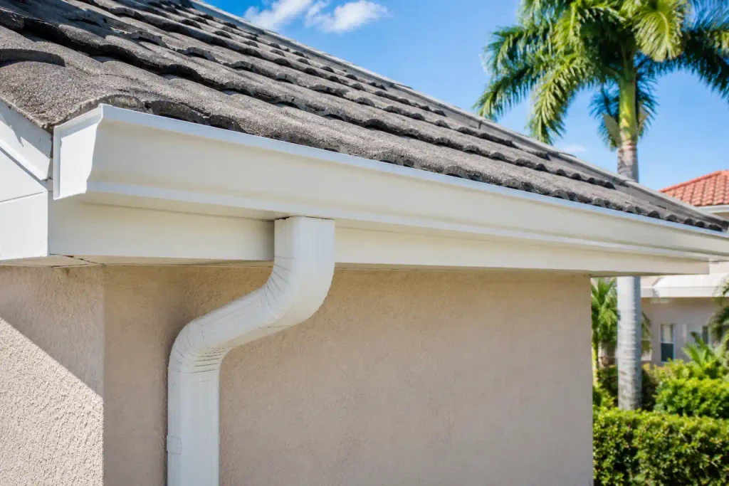 Properly repaired rain gutters protecting a Boynton Beach residential property